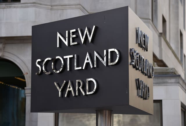The New Scotland Yard sign outside the Metropolitan Police headquarters 