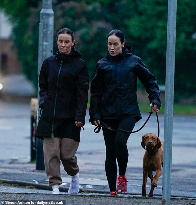 Lisa Zbozen (left), the wife of Jay Blades is seen with her sister Teresa walking the dog today