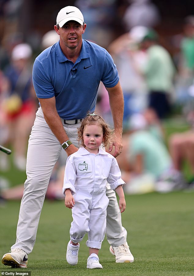 McIlroy is pictured with his daughter Poppy McIlroy during the 2023 Masters Par 3 contest